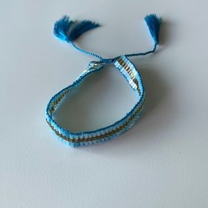 Bracelet - blue with delicate beads sliding knot